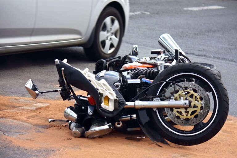 Motorcycle helmet, gloves, and insurance paperwork