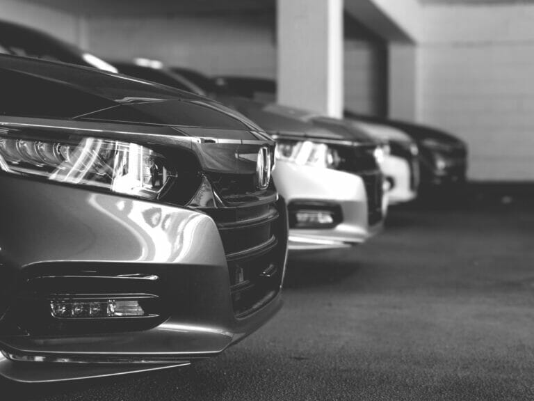 Rental car agreement, keys, and accident paperwork