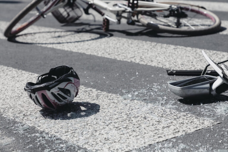 Bicycle accident scene on a roadway